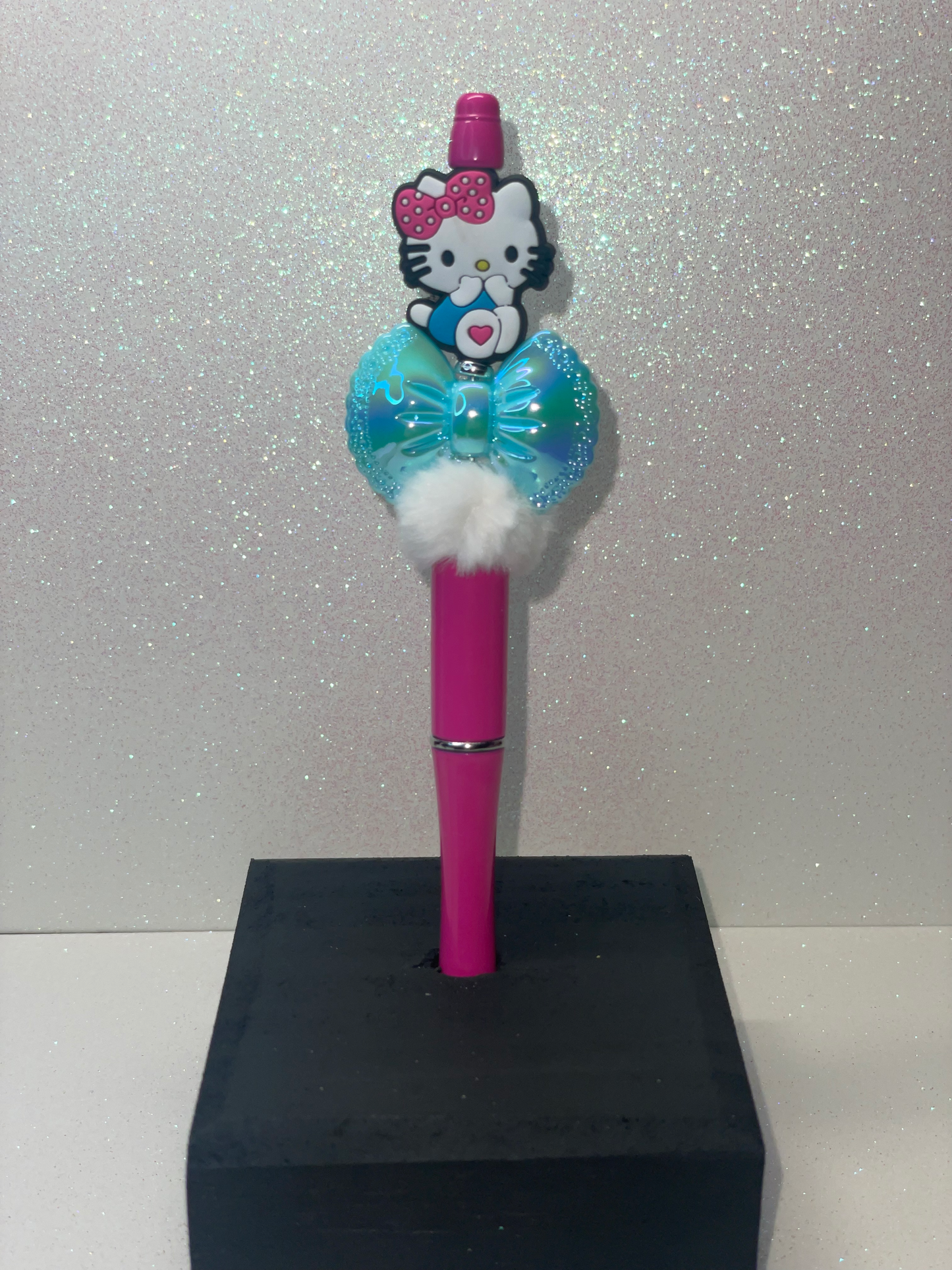 HK Turquoise bow pink pen