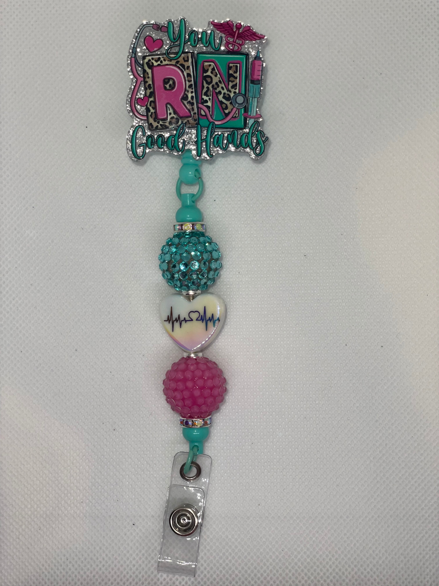 You RN good hands badge reel