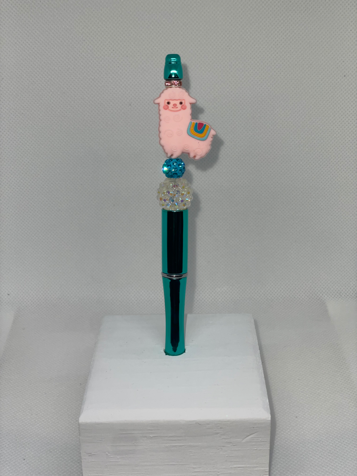 Pink Alpaca teal pen