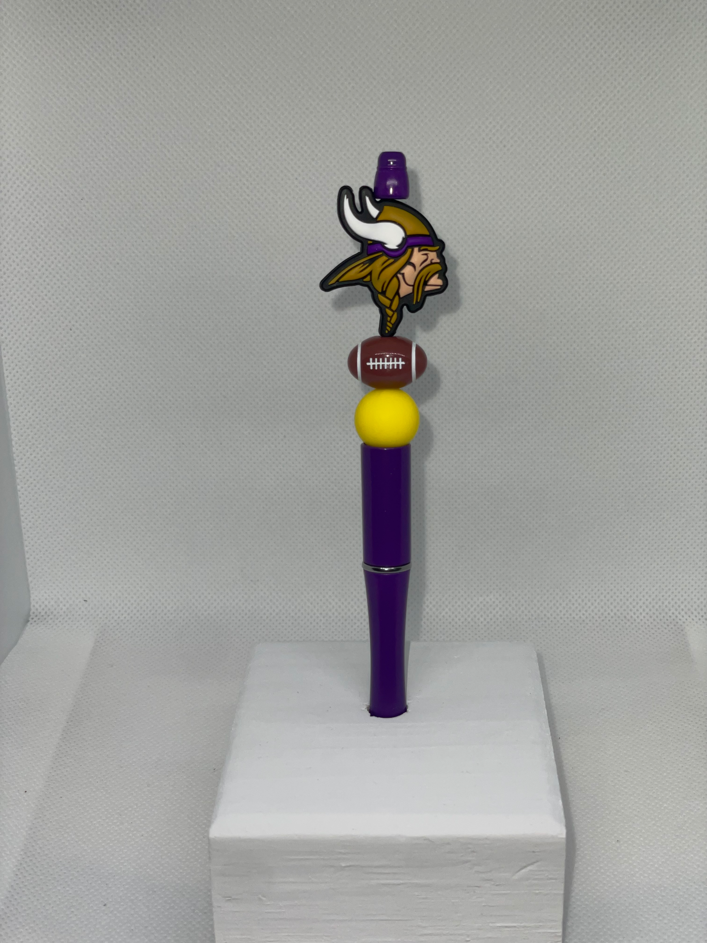M Vikings purple pen