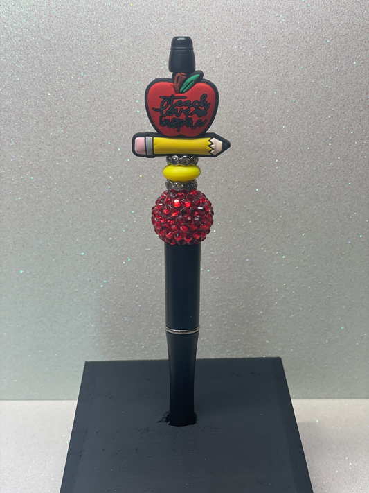 Teacher apple with pencil black pen