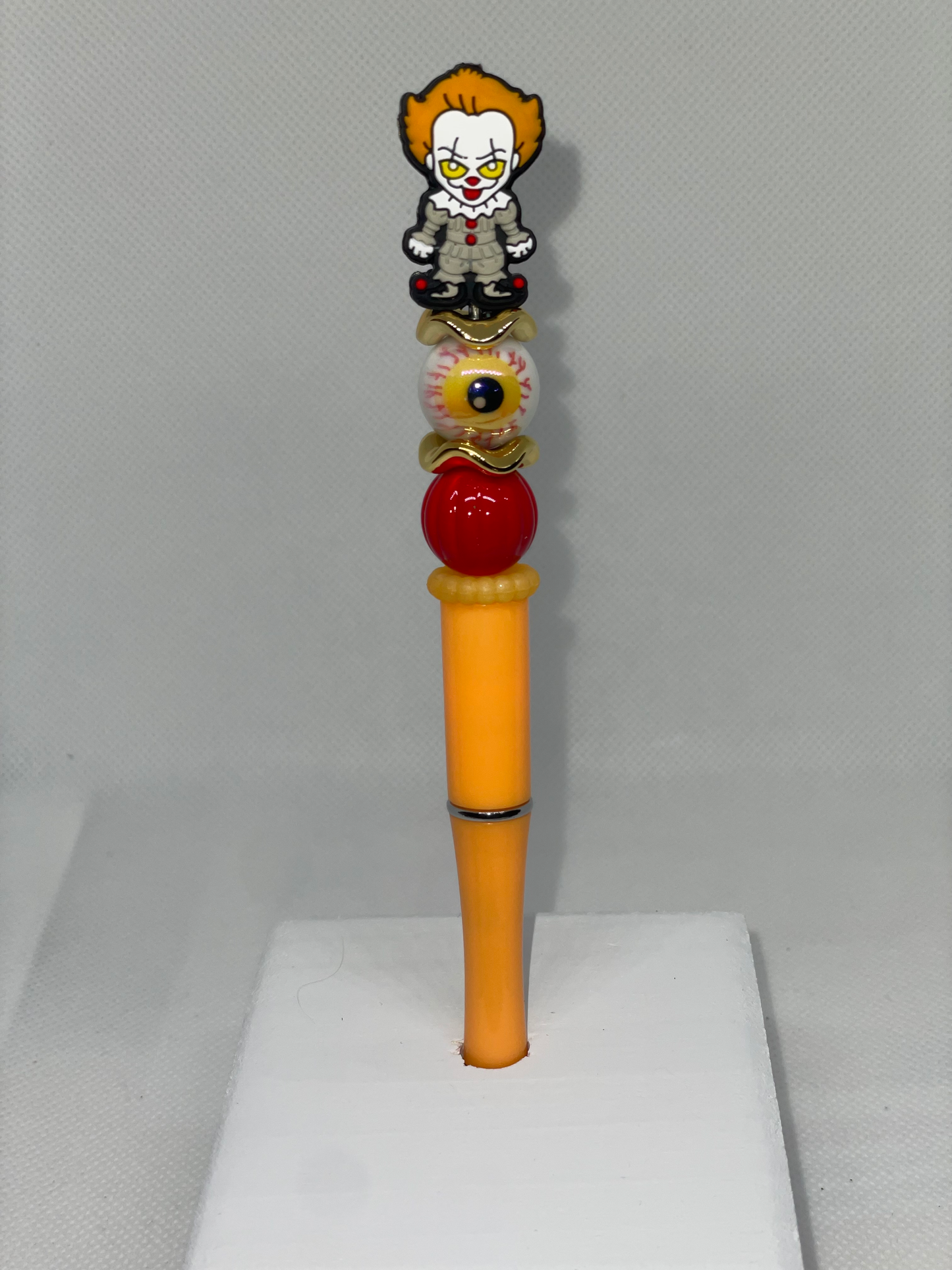 Penny Wise orange pen