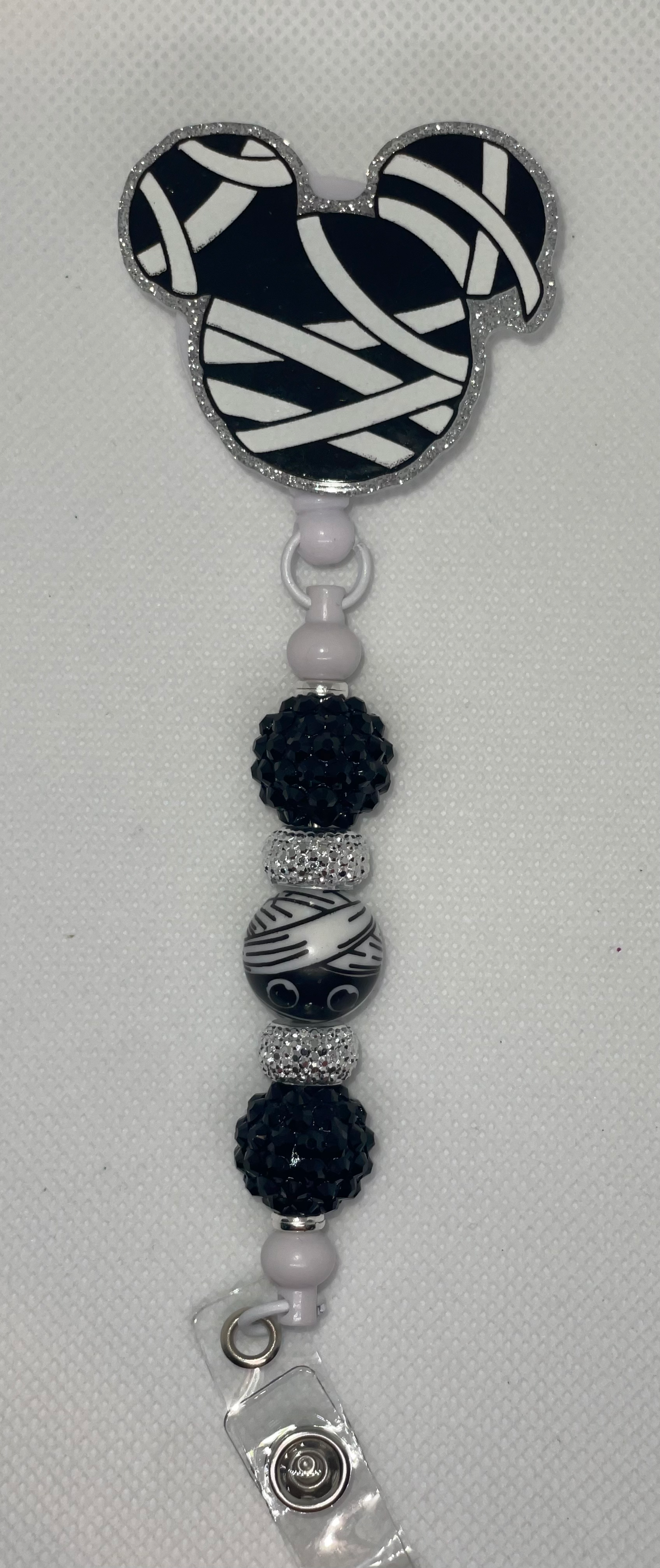 Mummy mouse badge reel