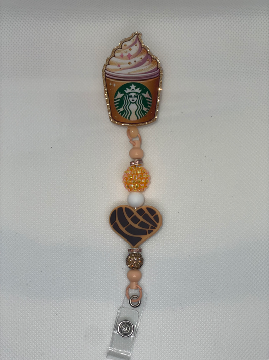 Coffee and Conch orange badge reel