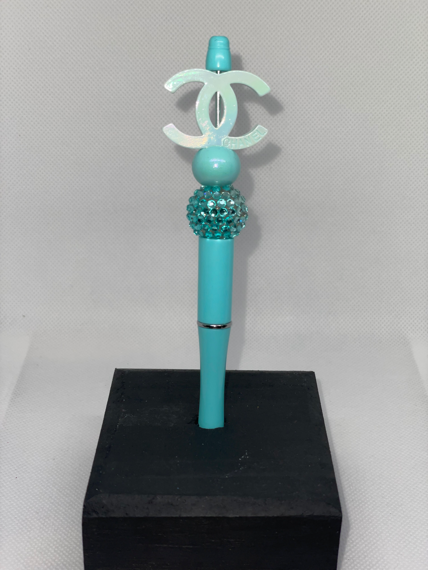 CC turquoise pen