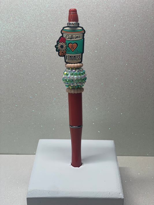 Caffeine and Kindness orange pen