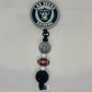 V Raiders football badge reel