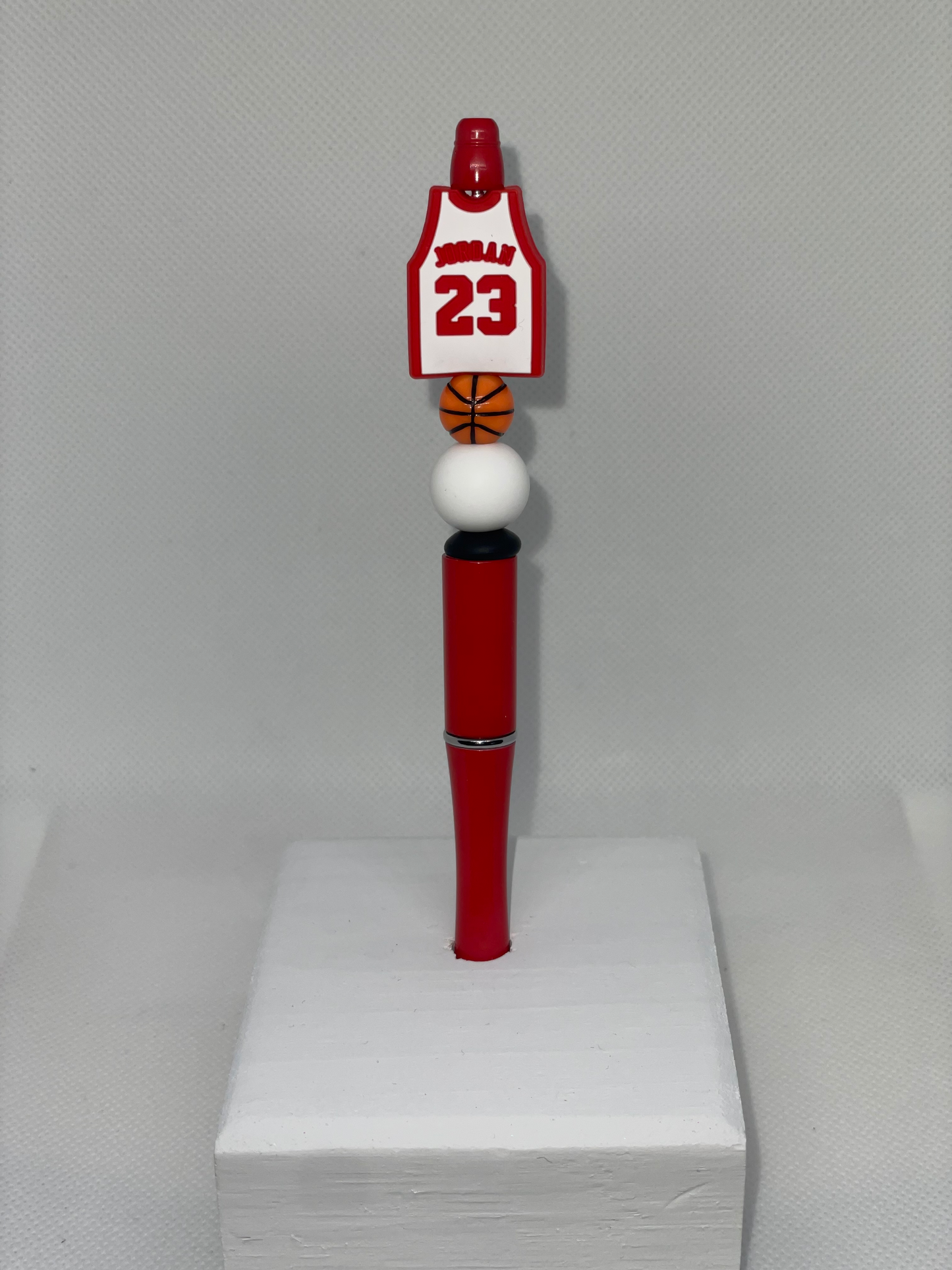 M Jordan red pen