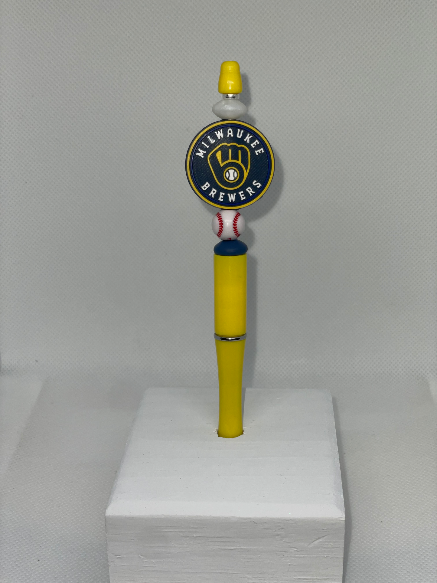 M Brewers baseball yellow pen